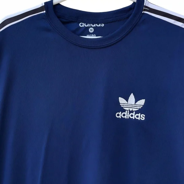 Dri fit Blue Adidas Tracksuit shirt close up